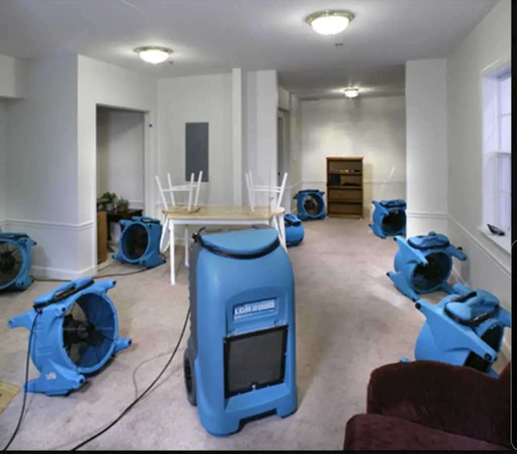 Air movers and dehumidifier setup for Water Extraction & Removal in Groton